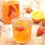 Refrigerator Iced Tea with oranges and strawberries