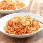 shrimp and linquine fra diavolo on a serving plate