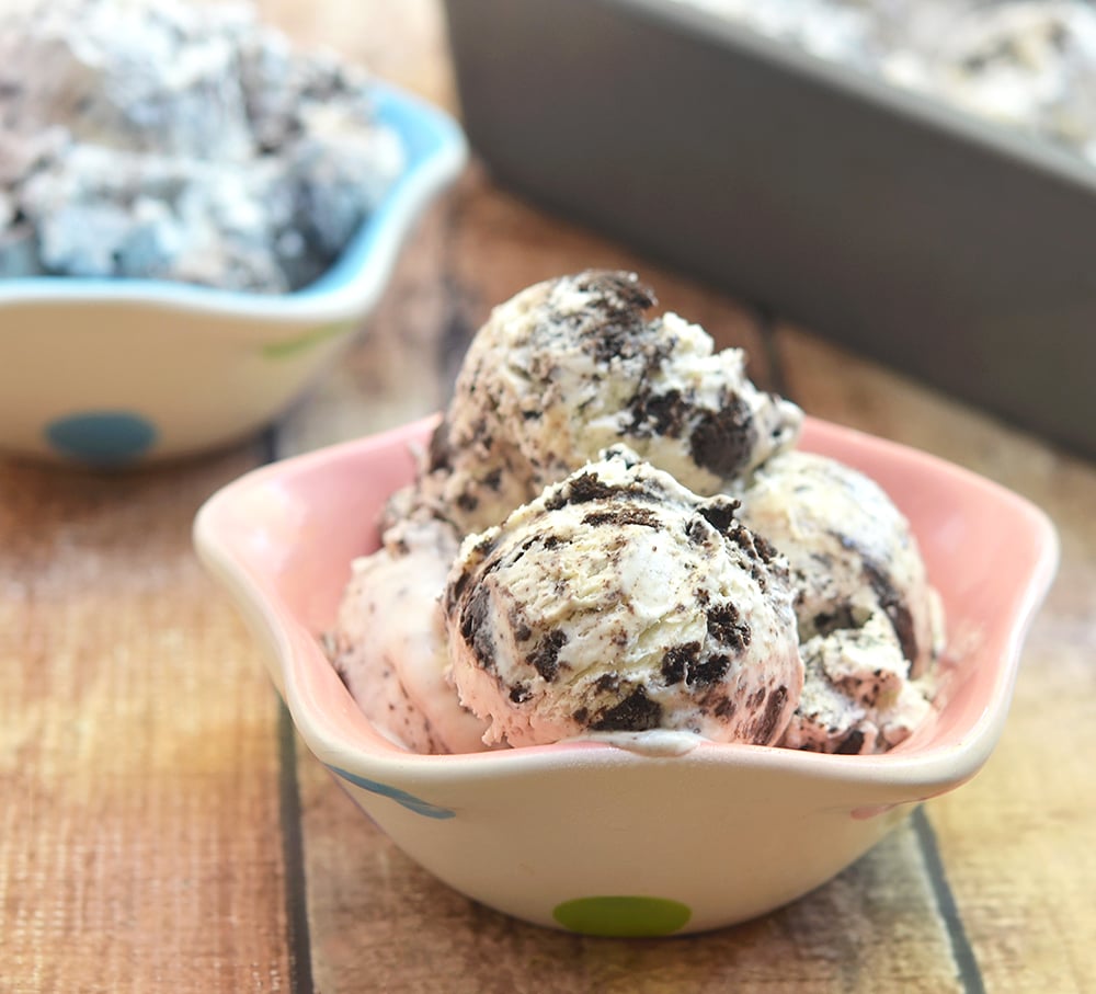 No-churn Cookies and Cream Ice Cream is rich, silky, and generously studded with Oreos! Only 4 ingredients and no ice cream maker or fancy equipment needed to make this amazing summer treat!!