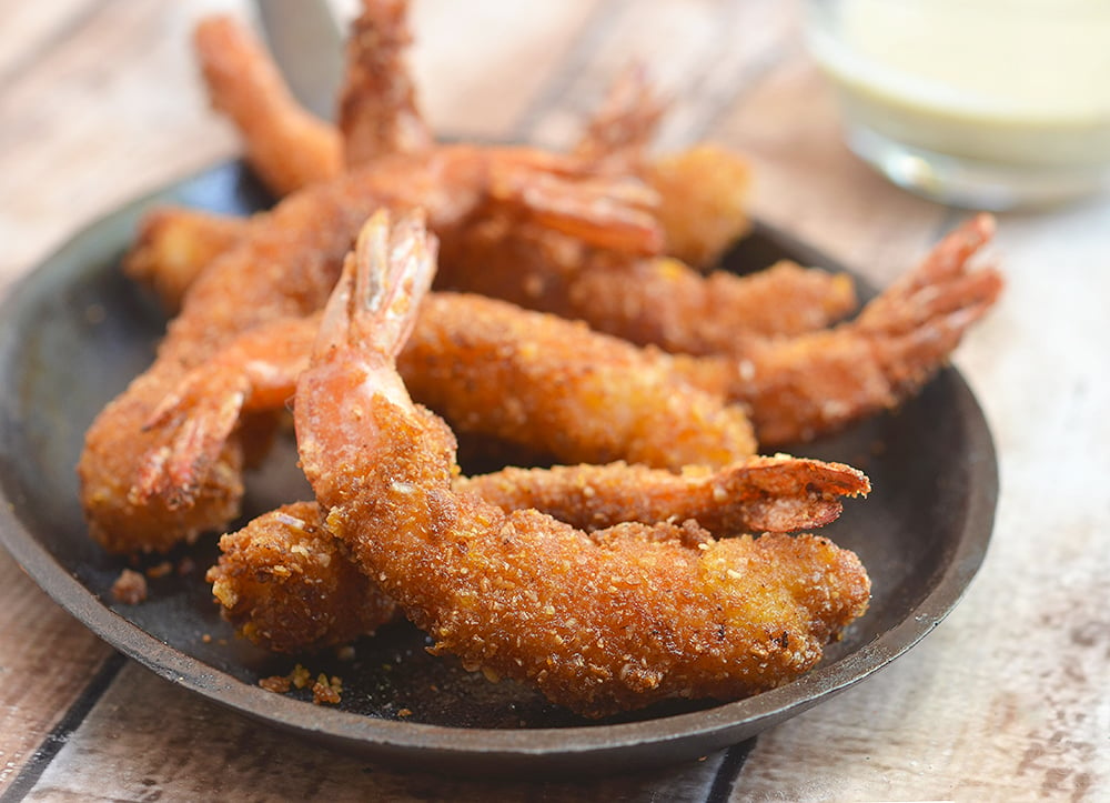 These crispy cereal crusted shrimp are delicious and addictive!