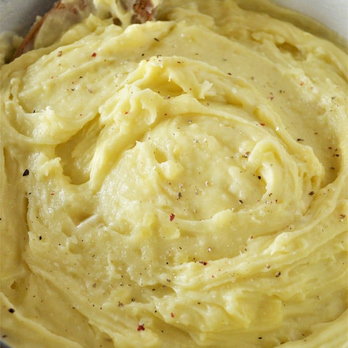 garlic mashed potatoes in a large serving bowl