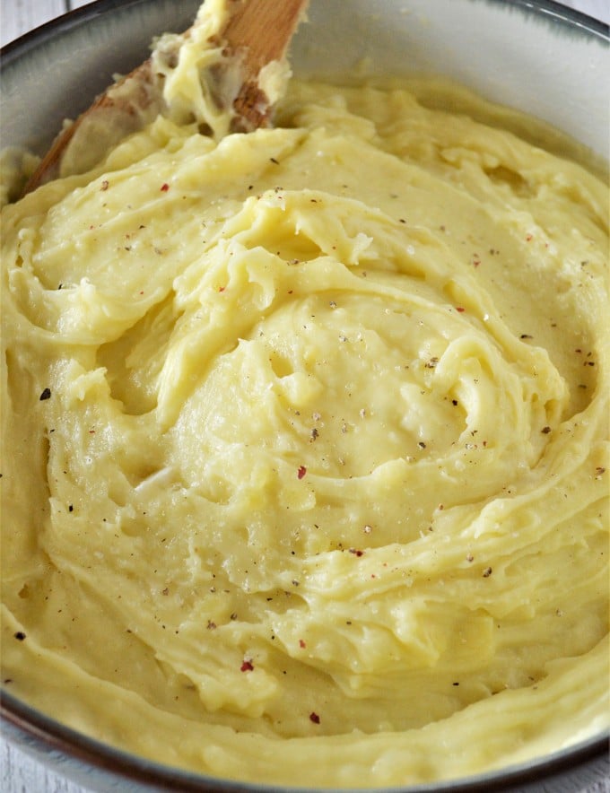 garlic mashed potatoes in a large serving bowl