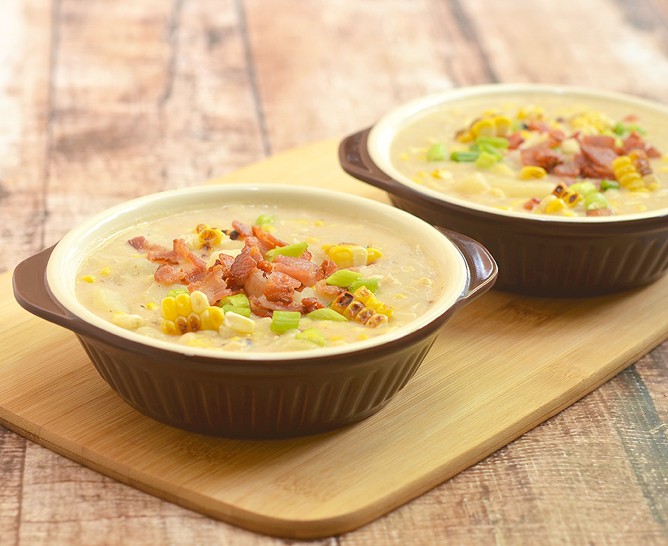 Grilled Corn Potato Chowder with grilled corn, potato, and crisp bacon bits.