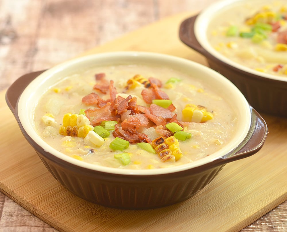 Grilled Corn Potato Chowder with grilled corn, potato, and crisp bacon bits. Rich, creamy, and hearty, it's the perfect comfort food!