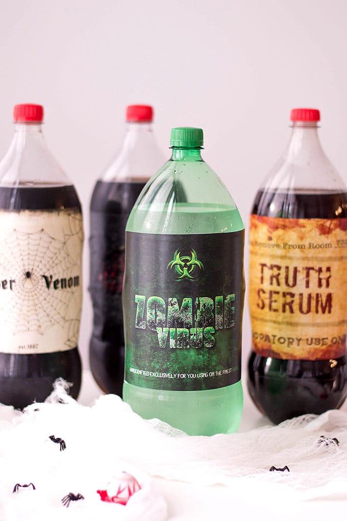 assorted soda bottles with halloween labels