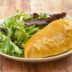 Honey Mustard Chicken on a plate with a side of green salad