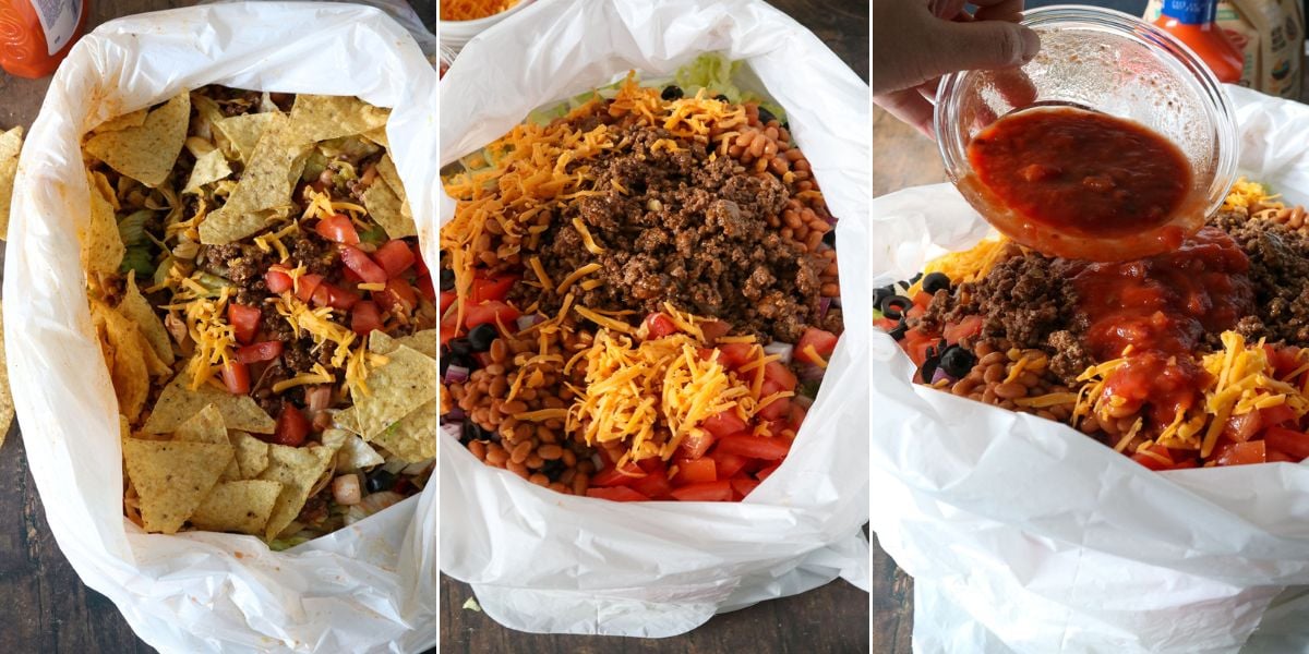 mixing taco salad in a trash bag