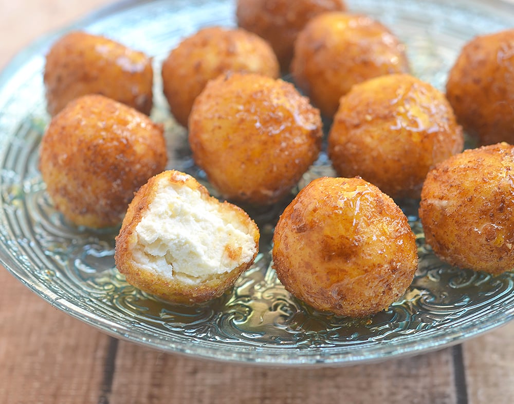 Fried Goat Cheese Balls drizzled with honey are sweet, creamy and crunchy. Perfect for a party!