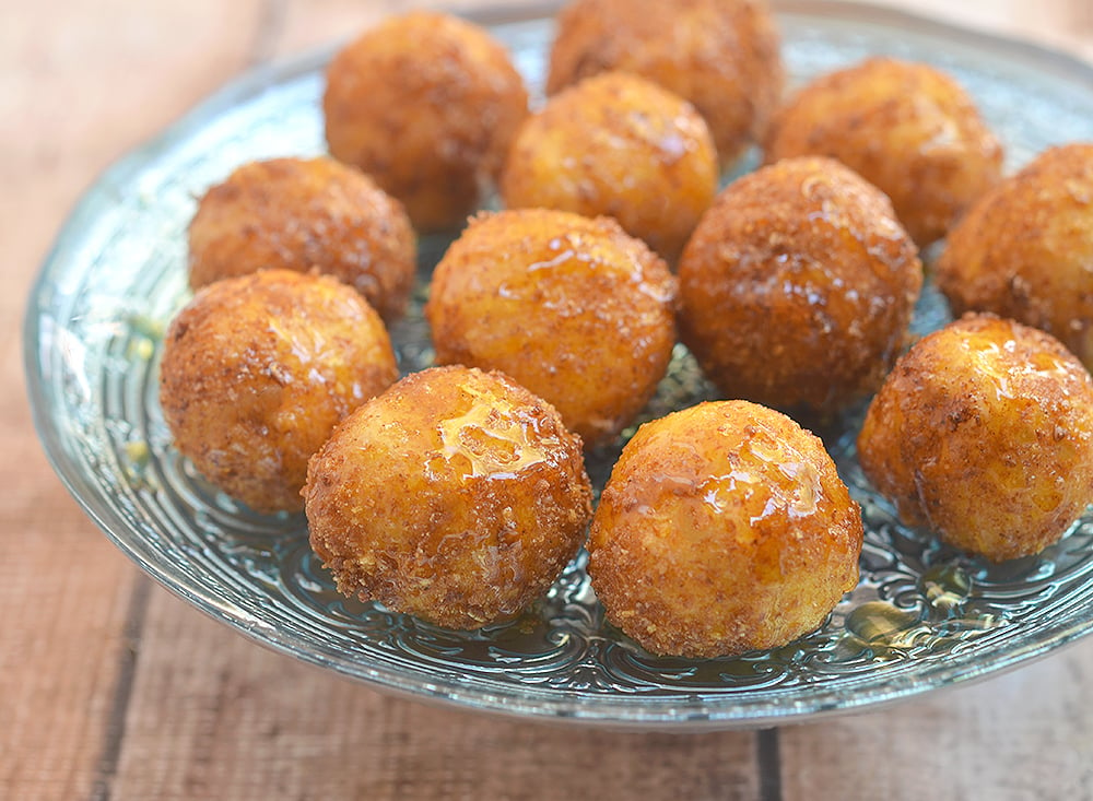 Fried Goat Cheese Balls with honey are easy to make and sure to be a party hit! 