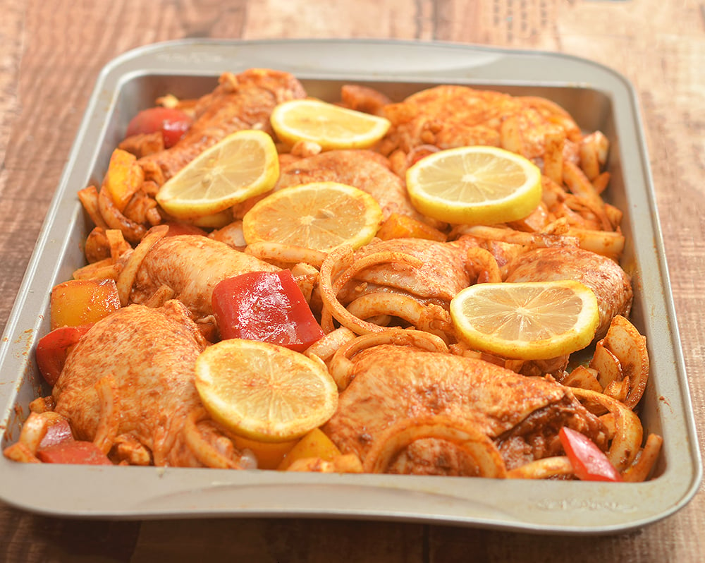 Roasted Chicken with Sweet Onions with sweet onions and peppers, lemon, and spices. This Peruvian-style roasted chicken has loads of flavor without the extra effort!