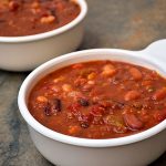 15-Bean Soup with Ham with assorted beans, ham, tomatoes, and Cajun spices for the ultimate cold weather comfort food. It's thick, hearty, delicious and the perfect use of your leftover ham!