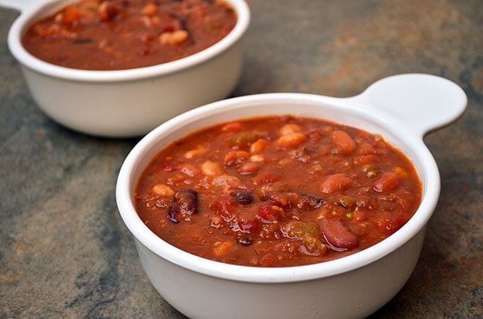 15-Bean Soup with Ham with assorted beans, ham, tomatoes, and Cajun spices for the ultimate cold weather comfort food. It's thick, hearty, delicious and the perfect use of your leftover ham!