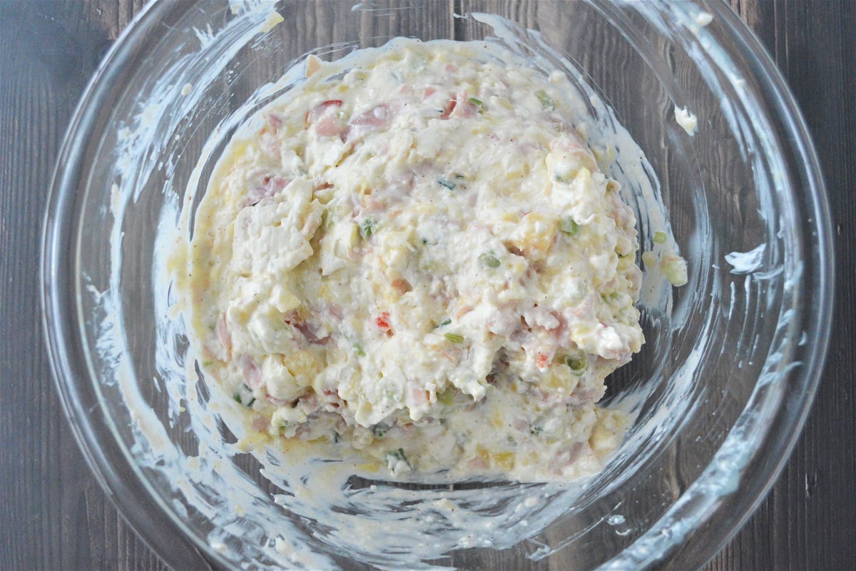 cheese ball mixture in a clear bowl