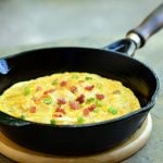 Potato Chip Omelette is a unique twist on the Spanish fritatta. Crisp potato chips add crunch and flavor to your regular omelette for delicious layer of yum!