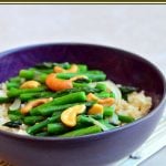 Asparagus and Cashew Stir-fry with tender-crisp asparagus and crunchy cashews served over nutty brown rice. A vegan dish that's as nutritious as it is delicious!