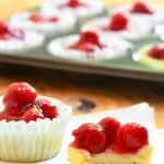 Mini Cherry Cheesecakes with vanilla wafer crust, creamy cheesecake, and cherry topping are as easy to make as they are delicious. They're the perfect-sized sweet treat for one but are just as amazing for a large crowd!