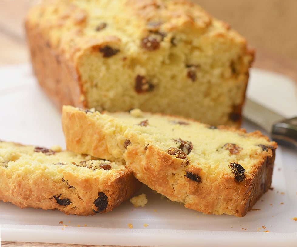 Moist and fluffy Irish Soda Bread with raisins sliced and ready to enjoy!