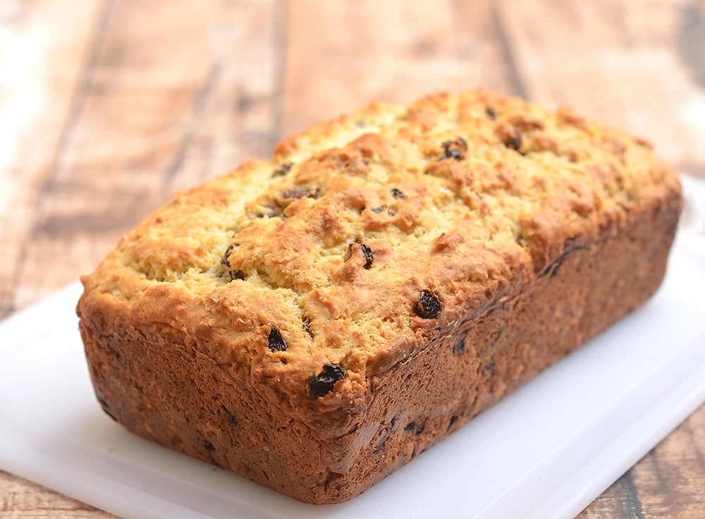 Irish Soda Bread with a delicious golden crust on the outside, moist and fluffy on the inside, and generously studded with plump raisins is the best quick bread loaf you'll ever have! It's perfect for all your St. Patrick's celebrations but just as good all year long