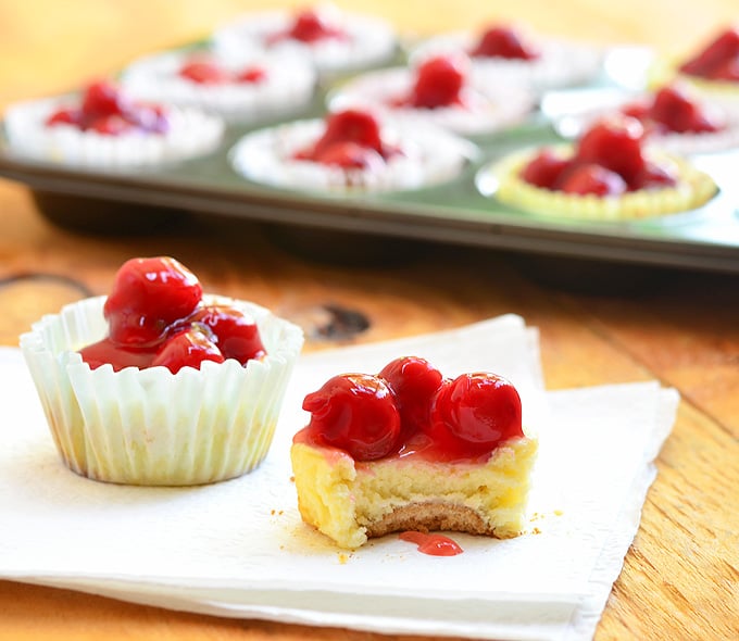 Mini Cherry Cheesecakes with vanilla wafer crust, creamy cheesecake, and cherry topping are as easy to make as they are delicious. They're the perfect-sized sweet treat for one but are just as amazing for a large crowd!