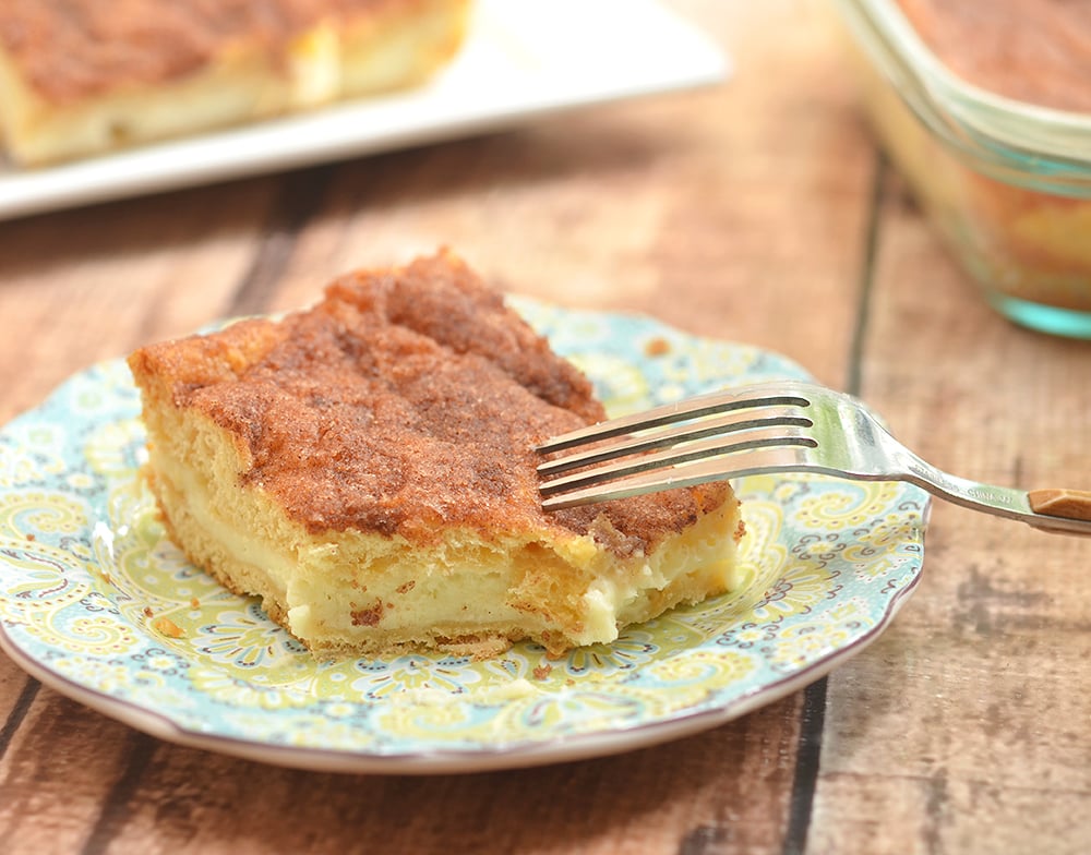 Sopapilla cheesecake bars  are the perfect dessert with pillowy, cinnamon pastry and dreamy cheesecake layers.