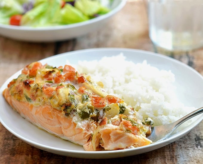 Salmon with Salsa Mayo Topping topped with fresh salsa and mayonnaise. Super moist and full of flavor, it's a quick and easy weeknight dinner the whole family will fight over.