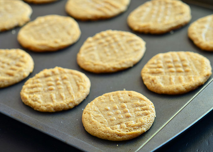 Unbelievable Three Ingredient Peanut Butter Cookies are so easy to make with only three ingredients and NO flour. With an intense peanut butter flavor, these gluten-free cookies are absolutely delicious!