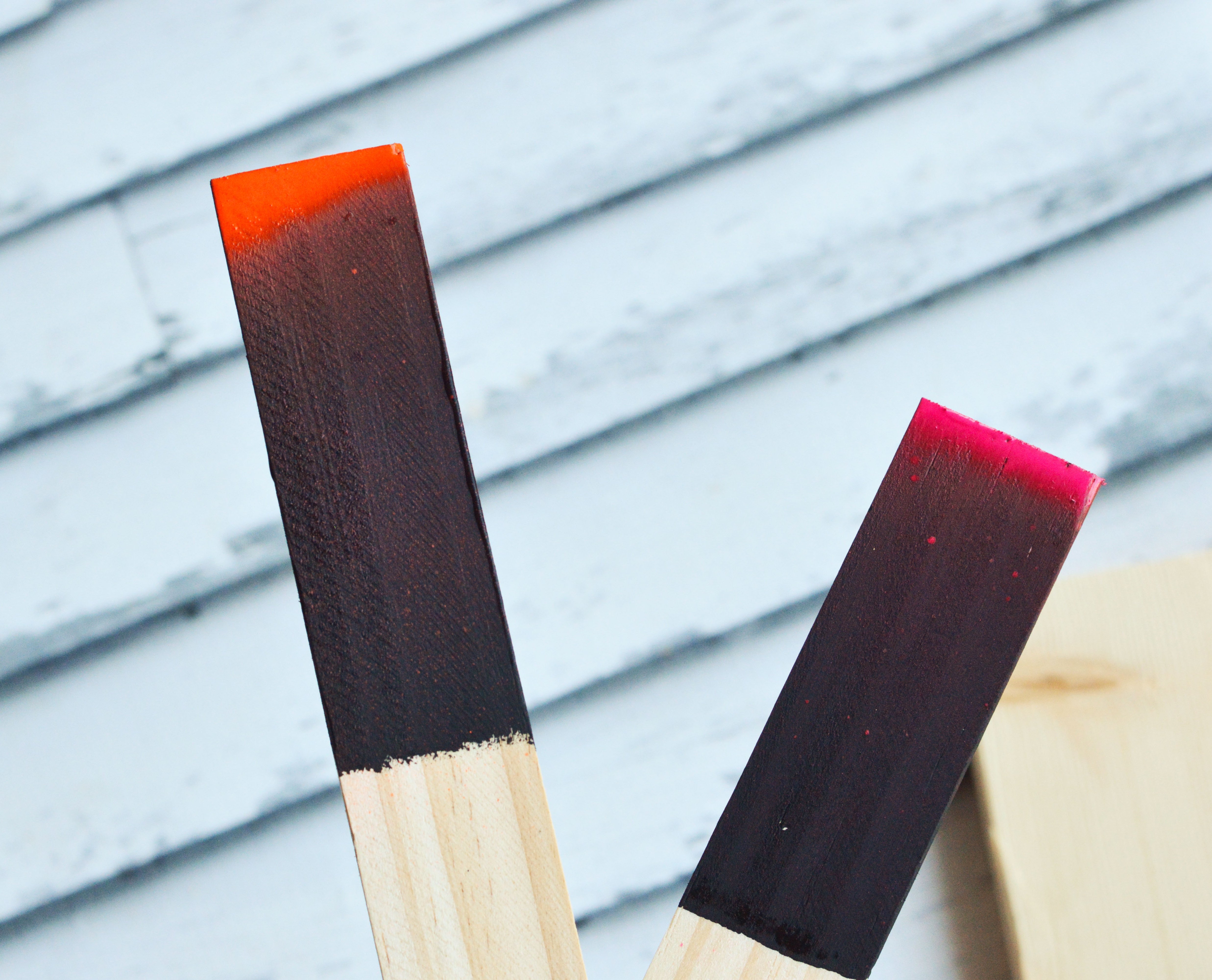 DIY Chalkboard Garden Markers make a cute addition to your garden! Made with sturdy wooden stakes and painted black chalkboard paint, they're reusable year after year!