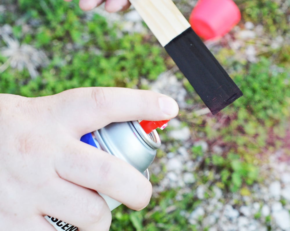 DIY Chalkboard Garden Markers make a cute addition to your garden! Made with sturdy wooden stakes and painted black chalkboard paint, they're reusable year after year!