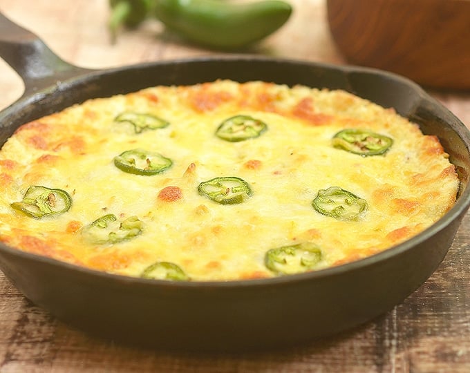 Cheesy Jalapeno Popper Dip in a cast iron pan