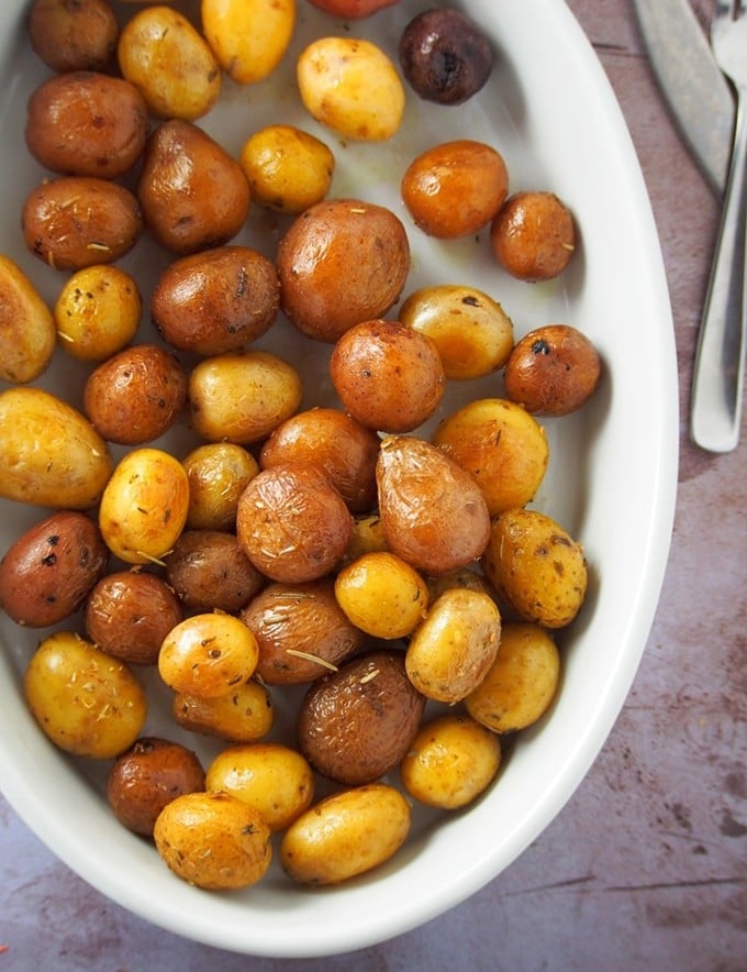 pressure cooker roasted potatoes in a white dish