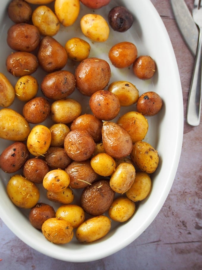 pressure cooker roasted potatoes in a white dish