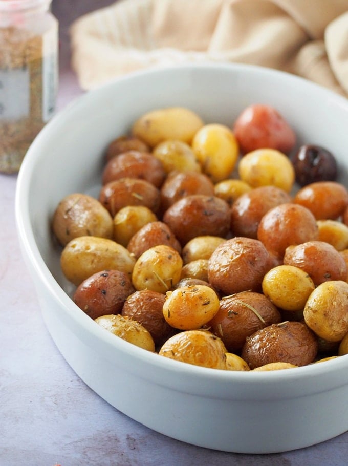 Instant Pot Herb Roasted Potatoes in a white dish