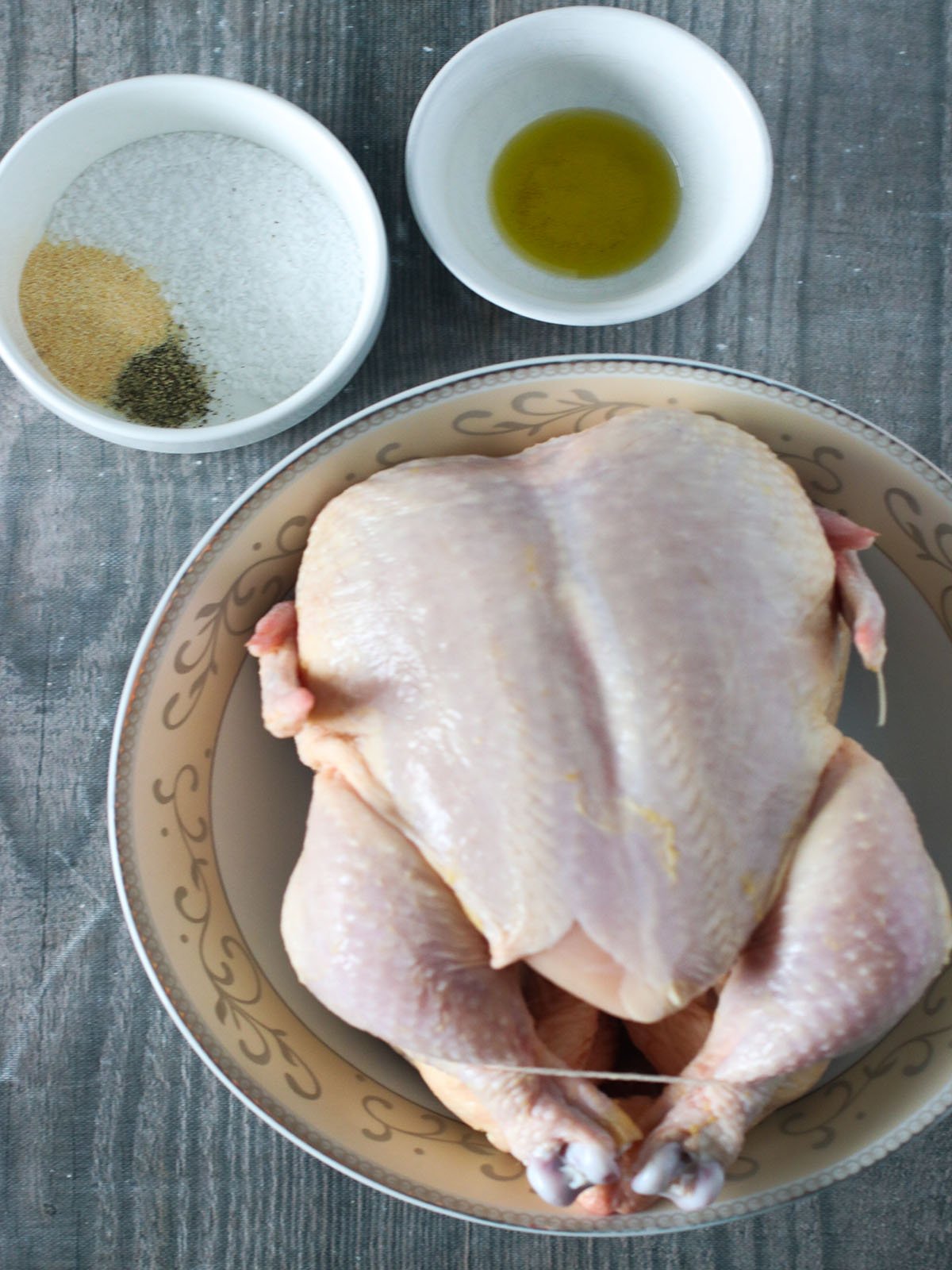 whole chicken, olive oil, salt, pepper, garlic powder