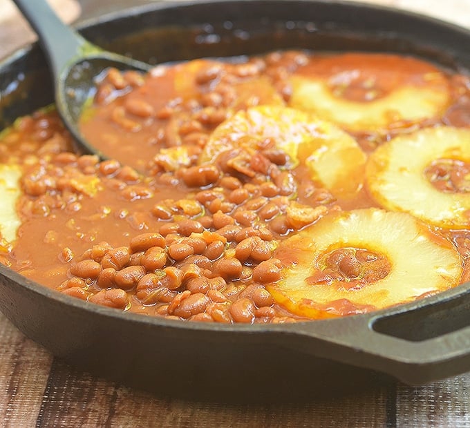 Everyone loves these sweet and savory bourbon baked beans. Salty bacon and pineapple round out the flavors. 