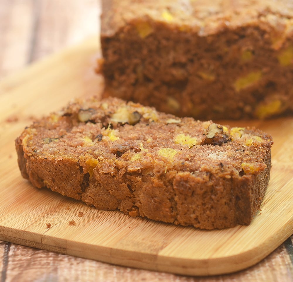 Peach Bread Loaf deliciously studded with fresh peach bits and bursting with warm cinnamon flavors. Super soft and moist, it's amazing for breakfast or anytime snack.