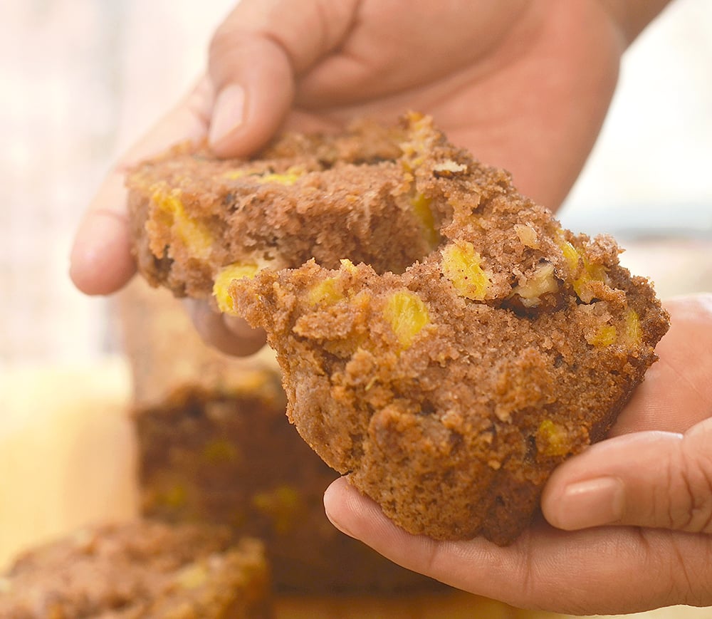 Peach Bread Loaf deliciously studded with fresh peach bits and bursting with warm cinnamon flavors. Super soft and moist, it's amazing for breakfast or anytime snack.