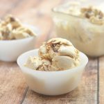 Double Peanut Butter Ice Cream with chunks of Reese's peanut butter cups in a rich peanut butter ice cream. So easy to make with only 4 ingredients and no churn or ice cream maker needed!