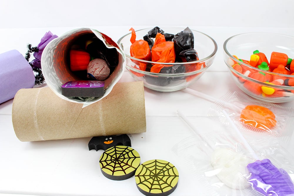 fill tubes with candies-are sure to take your trick or treat game to a whole new fun. Filled with candies and other goodies, they're the ultimate Halloween party favors!