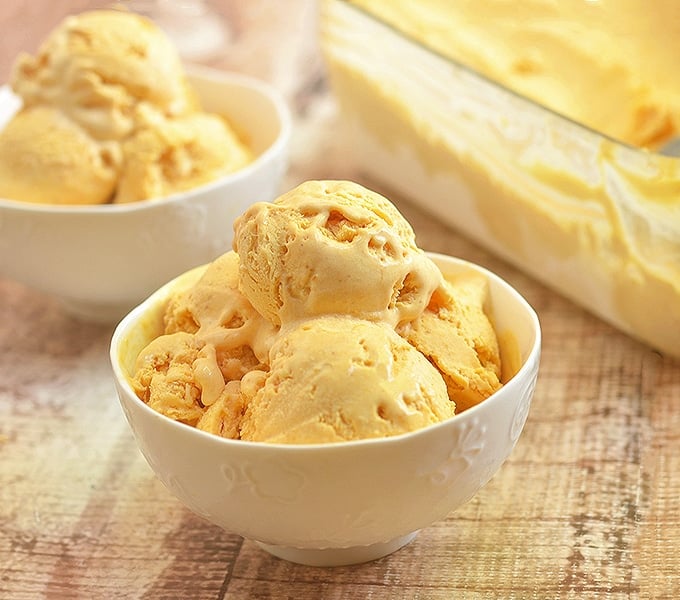 homemade pumpkin ice cream in white bowls