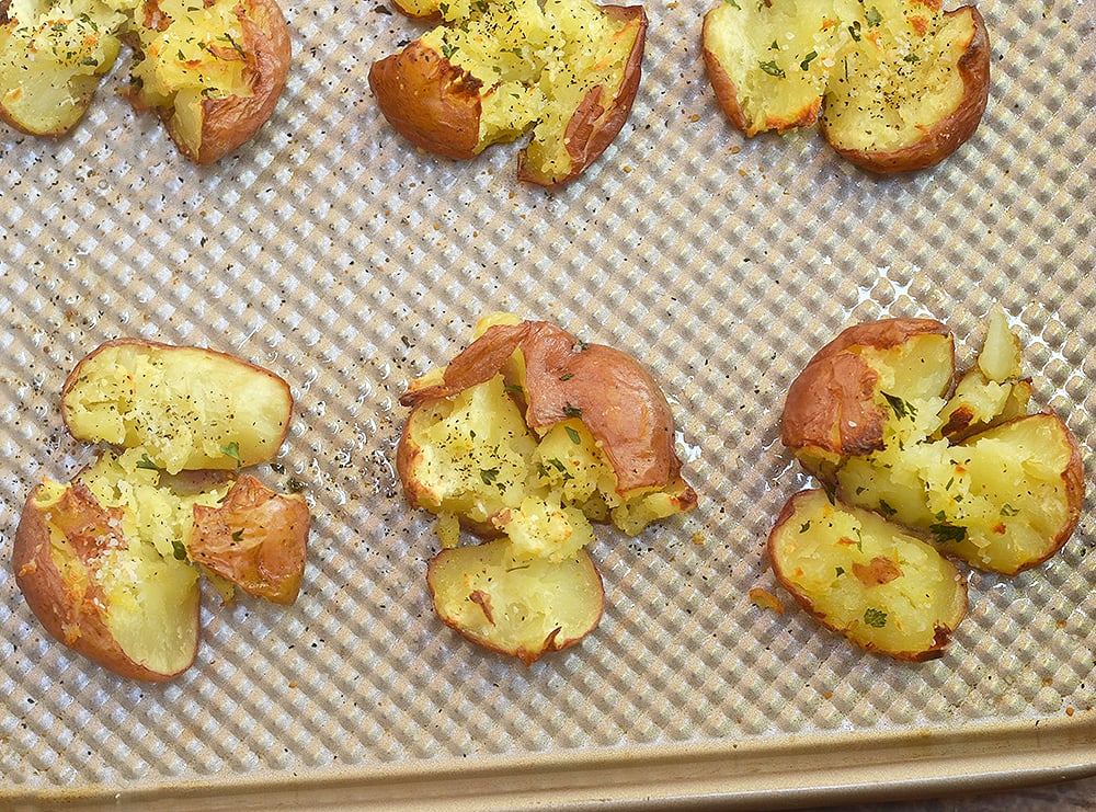 Smashed Red Potatoes with Parmesan for crispy, fluffy and one of the tastiest side dish you'll ever have!