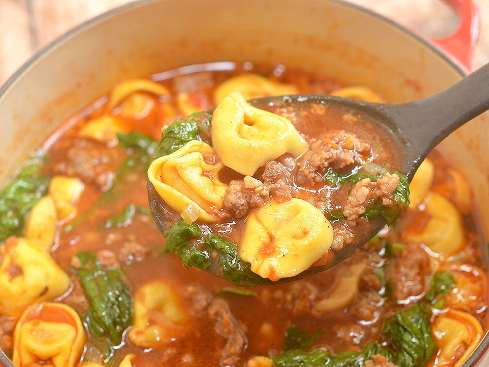 Sausage Tortellini Soup is packed with spicy Italian sausage, tender cheese tortellini and baby spinach. A hearty and satisfying meal 