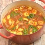 Sausage Tortellini Soup chockful of spicy Italian sausage, cheese tortellini, and baby spinach is hearty, delicious, and the perfect meal for chilly weather. Quick and easy to make and cooks in one pot!