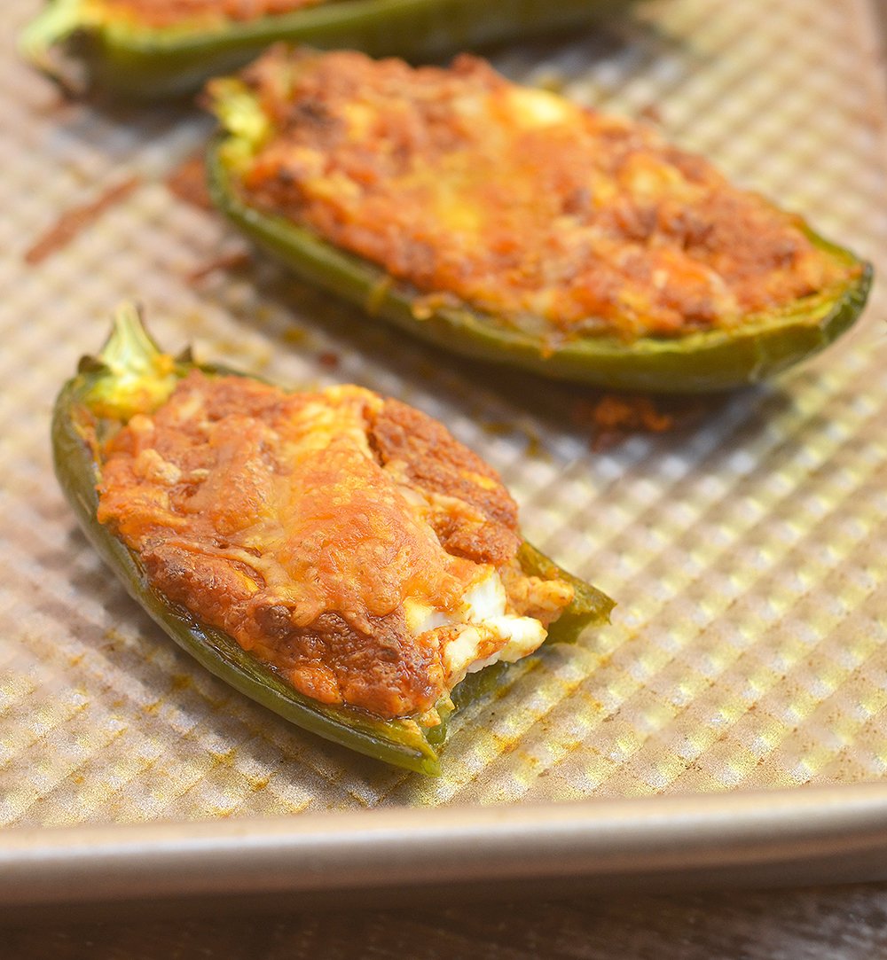 Stuffed Jalapeno peppers are creamy, spicy and seriously addicting. Perfect for game day!