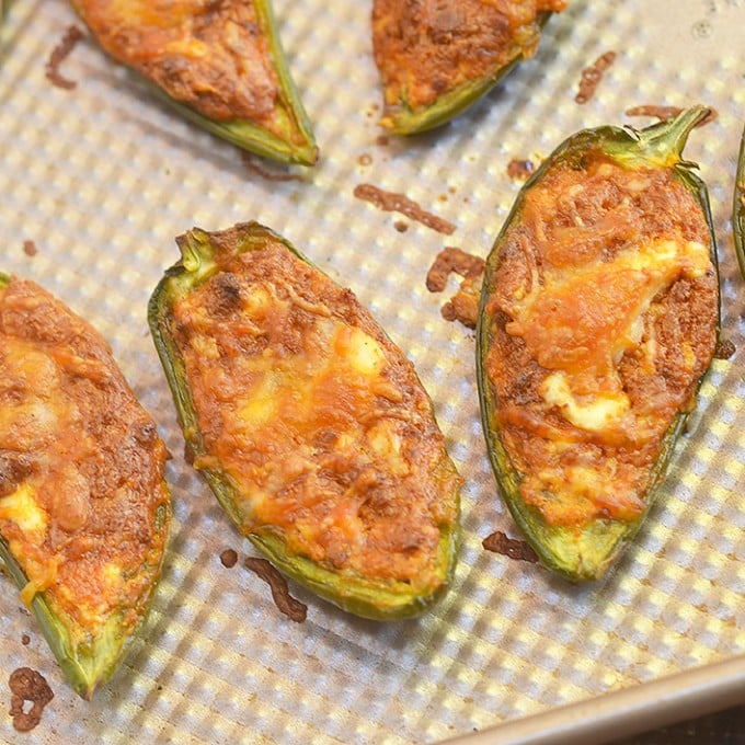 Chorizo-Stuffed Jalapeno Poppers filled with chorizo, cream cheese, and shredded Mexican cheese blend are the perfect game day eats! They're smoky, spicy, creamy and full of bold flavors you'll love in an appetizer!