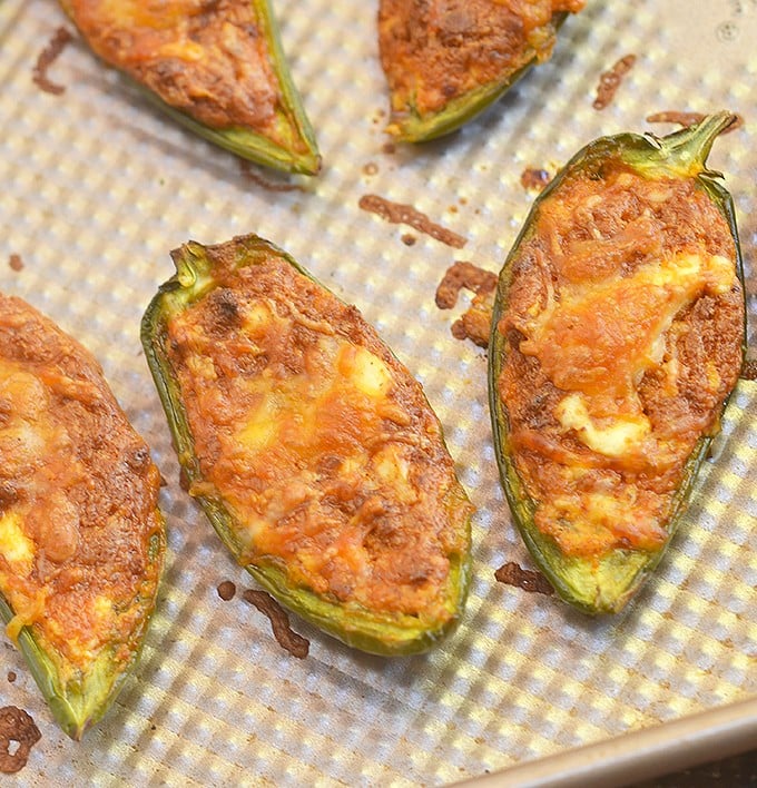 Chorizo-Stuffed Jalapeno Poppers filled with chorizo, cream cheese, and shredded Mexican cheese blend are the perfect game day eats! They're smoky, spicy, creamy and full of bold flavors you'll love in an appetizer!