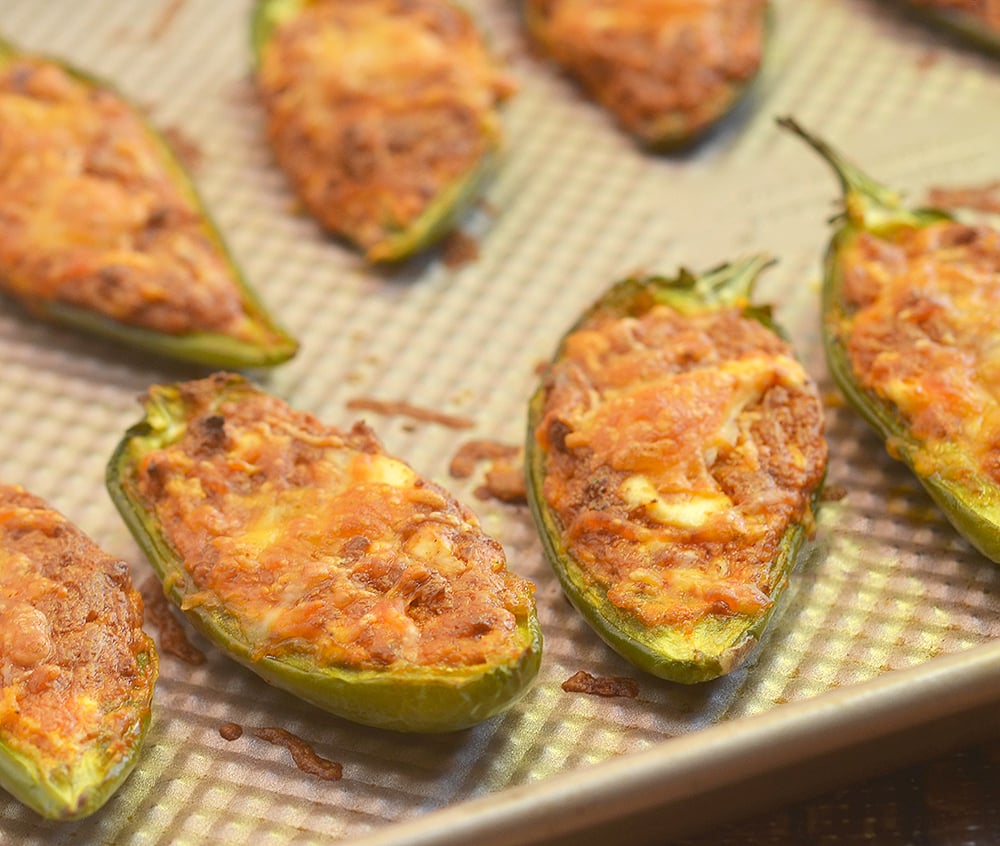 Stuffed Jalapenos with chorizo are easy to make yet absolutely addicting. They're creamy, spicy and bursting with bold flavors!