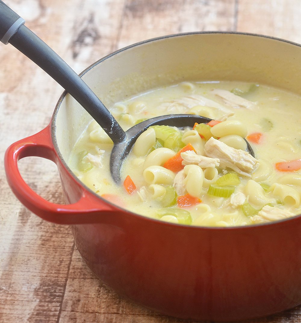 Homemade Creamy Chicken Noodle Soup is the epitome of comfort food! Rich, creamy and loaded with moist chicken, noodles, tender vegetables, it's the best thing to warm up with all year round!