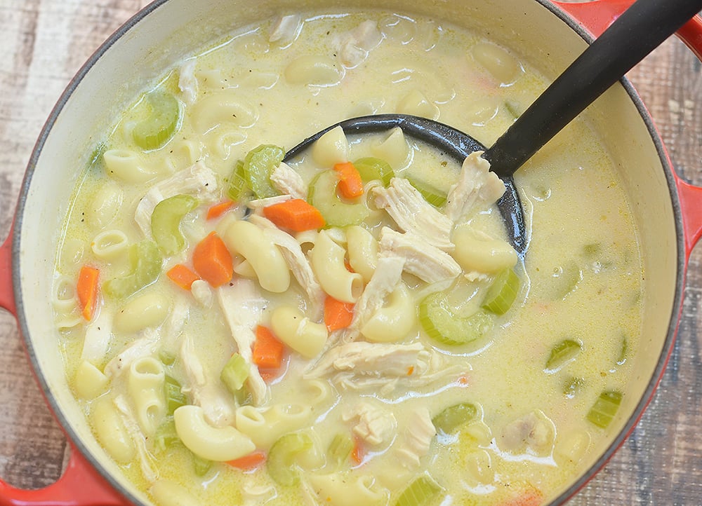 Creamy Chicken Noodle Soup is the epitome of comfort food! Rich, creamy and loaded with moist chicken, noodles, tender vegetables, it's the best thing to warm up with all year round!