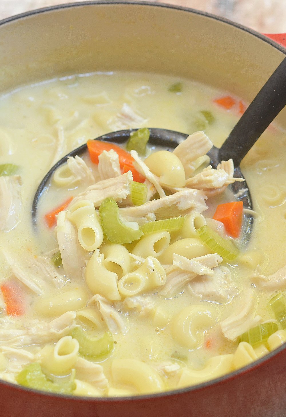 Easy Creamy Chicken Noodle Soup is the epitome of comfort food! Rich, creamy and loaded with moist chicken, noodles, tender vegetables, it's the best thing to warm up with all year round!