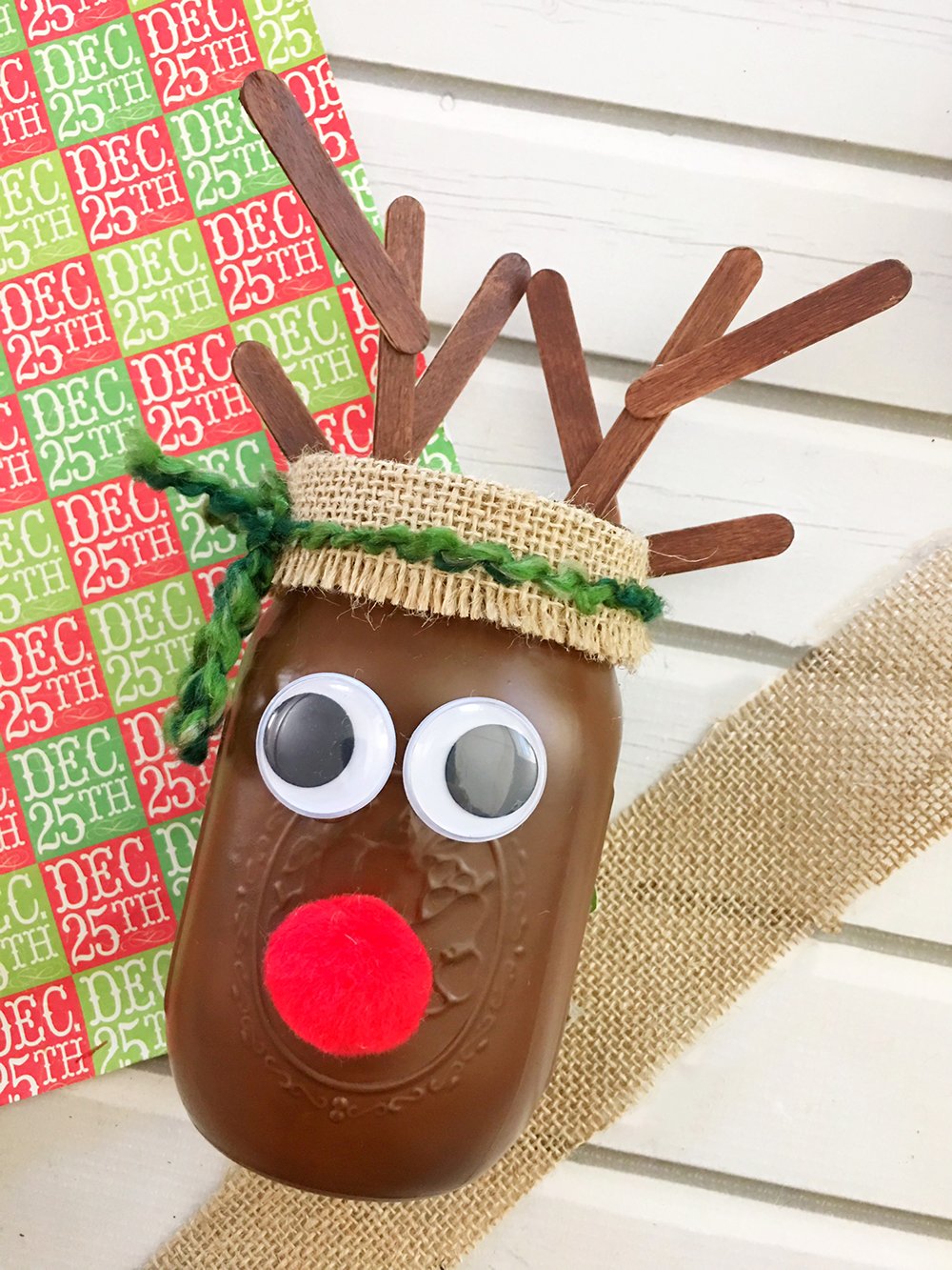 DIY Christmas Reindeer Mason Jar is perfect for holiday gift giving and home decorating. It's a fun and easy Christmas craft activity for the whole family!